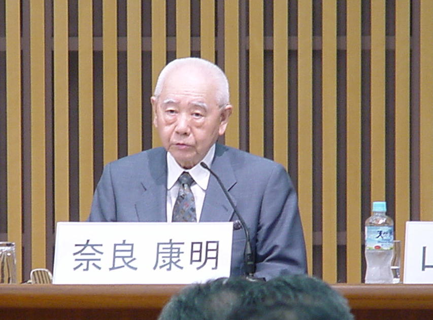 良康明